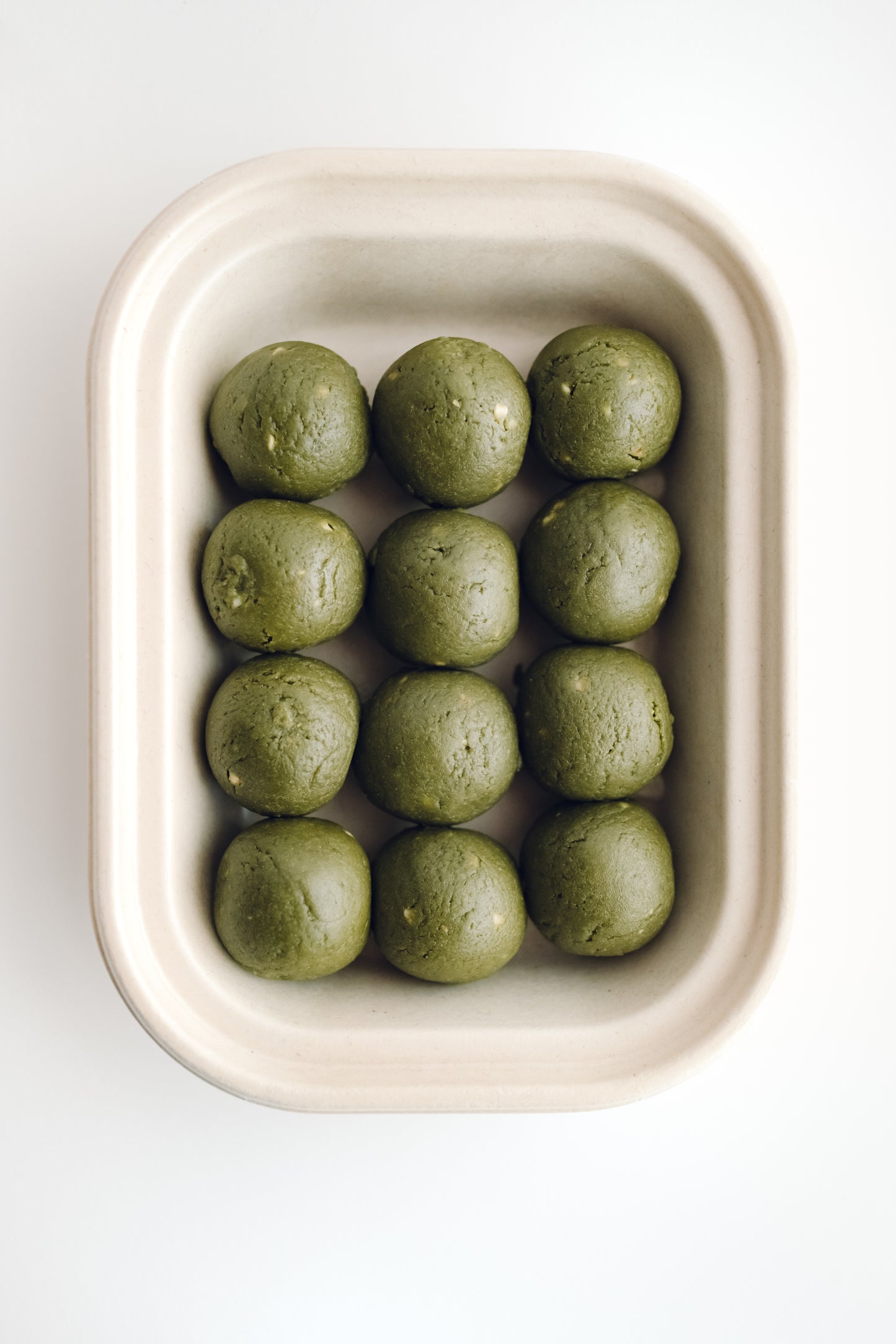 Raspberry Jam Filled Matcha Bliss Balls